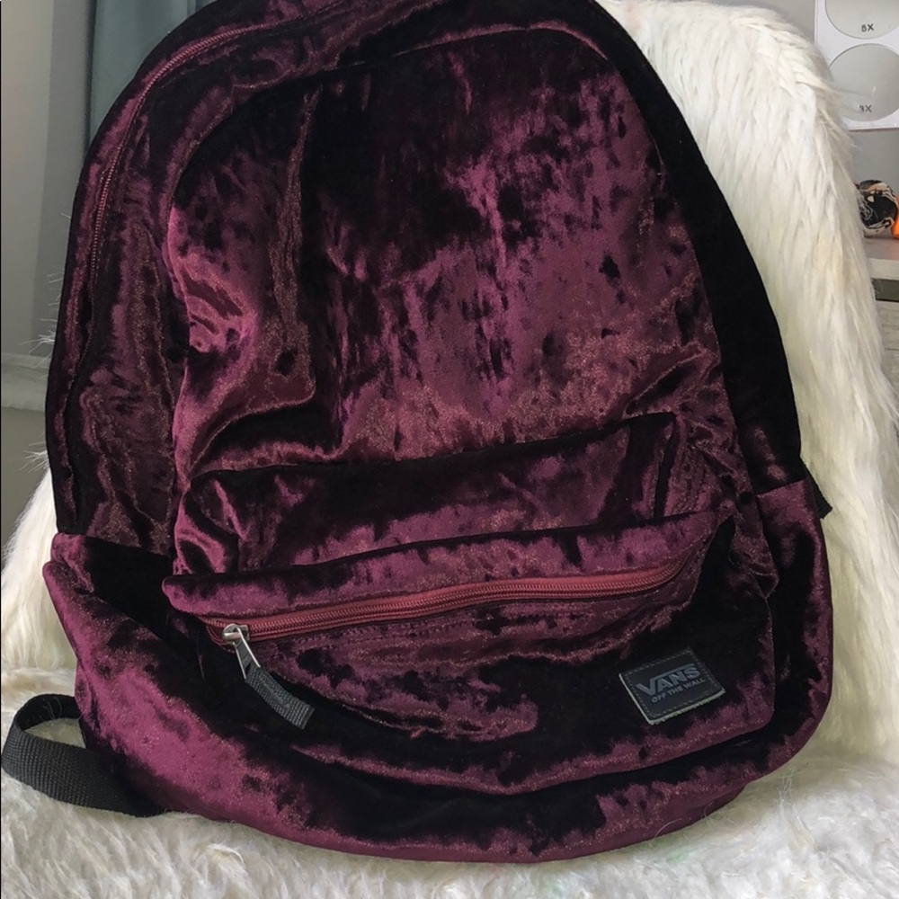 Vans maroon velvet backpack.